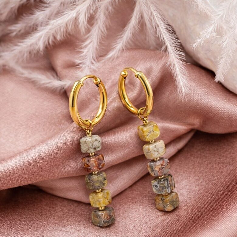 Auskari "Saulrieta noskaņa"